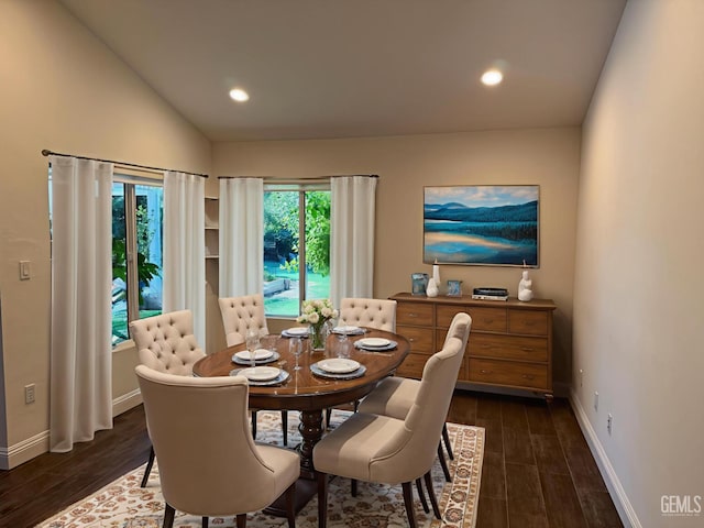 7009 Quailwood Dr, Bakersfield, CA 93309 - dining space with plenty of natural light, dark wood finished floors, lofted ceiling, and recessed lighting