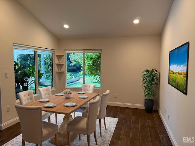 7009 Quailwood Dr, Bakersfield, CA 93309 - dining area featuring dark wood-style flooring, recessed lighting, and high vaulted ceiling