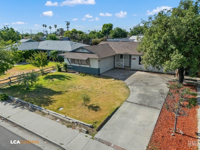 2109 Custer Ave, Bakersfield, CA 93304 - ranch-style home with an attached garage, concrete driveway, a shingled roof, and brick siding