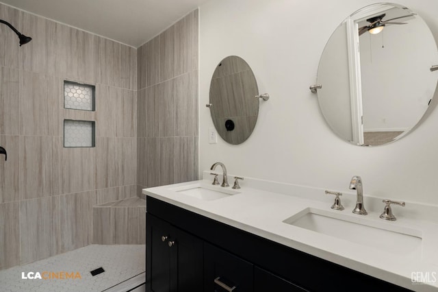 2109 Custer Ave, Bakersfield, CA 93304 - bathroom with ceiling fan, a tile shower, and double vanity