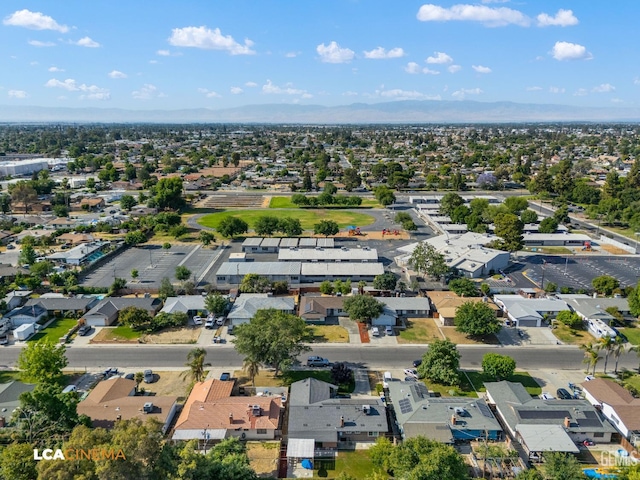2109 Custer Ave, Bakersfield, CA 93304 - aerial view of property and surrounding area featuring nearby suburban area and mountains
