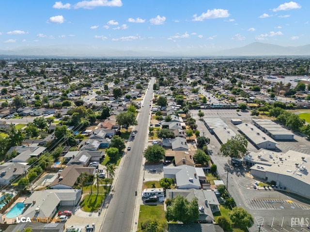 2109 Custer Ave, Bakersfield, CA 93304 - aerial view of property and surrounding area with nearby suburban area and mountains