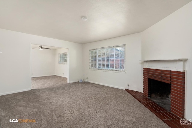 2109 Custer Ave, Bakersfield, CA 93304 - unfurnished living room with carpet floors, a brick fireplace, plenty of natural light, and baseboards