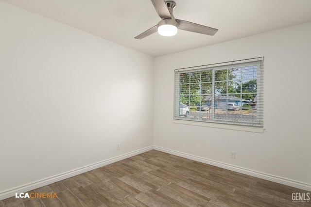 2109 Custer Ave, Bakersfield, CA 93304 - spare room featuring wood finished floors, baseboards, and a ceiling fan