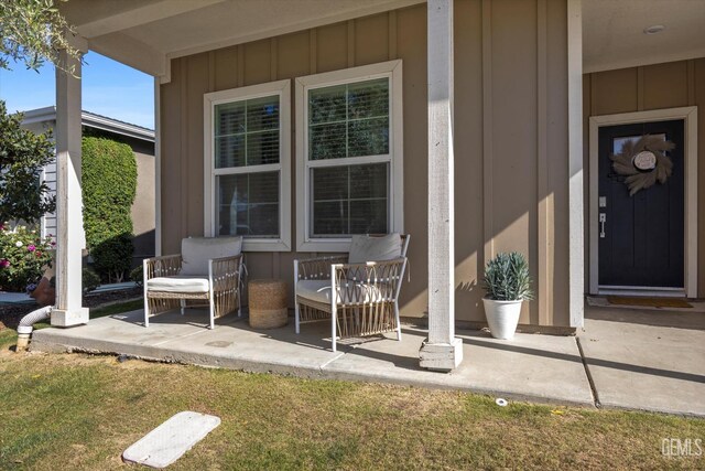 9642 Silver Falls Ln, Shafter, CA 93263 - property entrance featuring board and batten siding