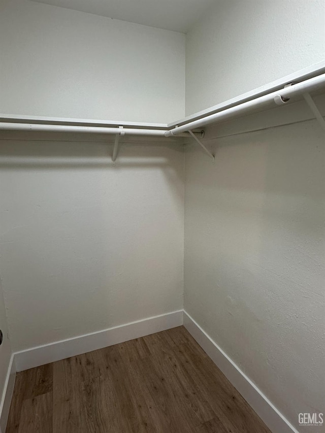320 10th St, Mc Farland, CA 93250 - spacious closet featuring wood finished floors