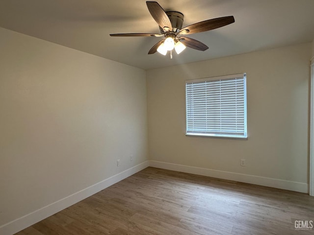 320 10th St, Mc Farland, CA 93250 - empty room featuring baseboards, ceiling fan, and wood finished floors