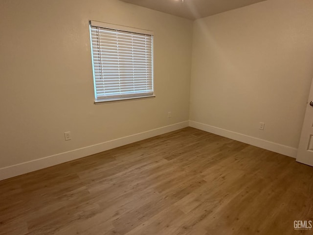 320 10th St, Mc Farland, CA 93250 - unfurnished room featuring baseboards and wood finished floors