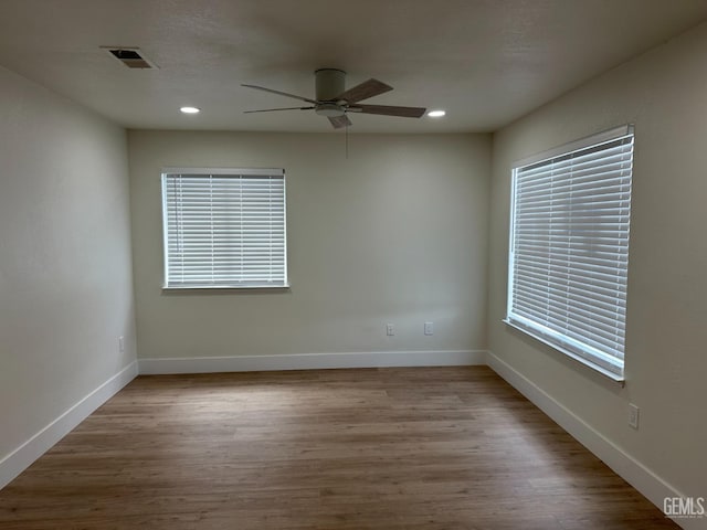 320 10th St, Mc Farland, CA 93250 - empty room with baseboards, a ceiling fan, and wood finished floors