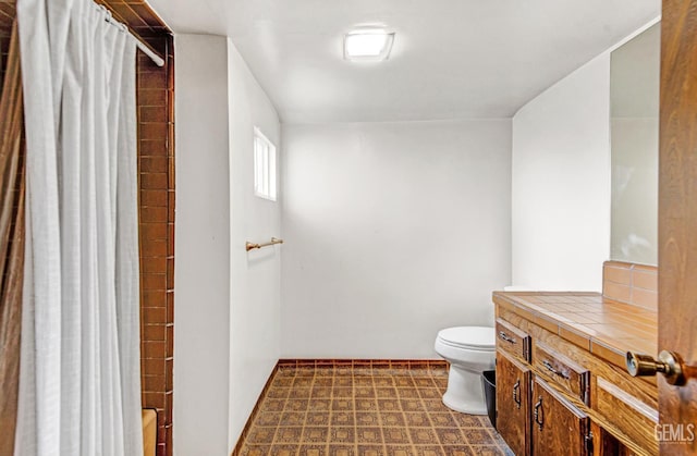 7701 Shetland Dr, Bakersfield, CA 93309 - full bathroom with vanity and tile patterned floors