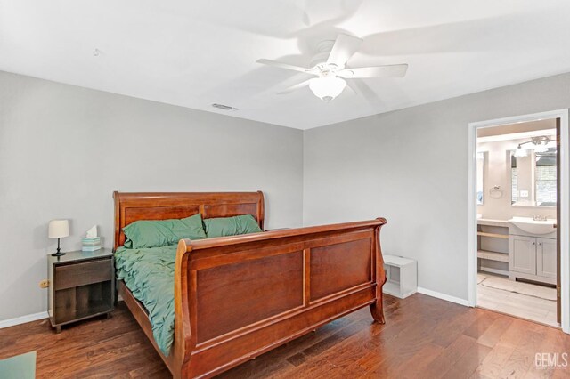 7701 Shetland Dr, Bakersfield, CA 93309 - bedroom with wood finished floors, a ceiling fan, and connected bathroom
