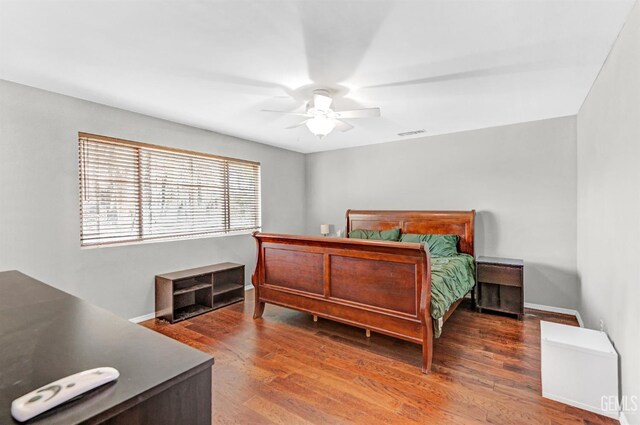 7701 Shetland Dr, Bakersfield, CA 93309 - bedroom featuring wood finished floors and a ceiling fan