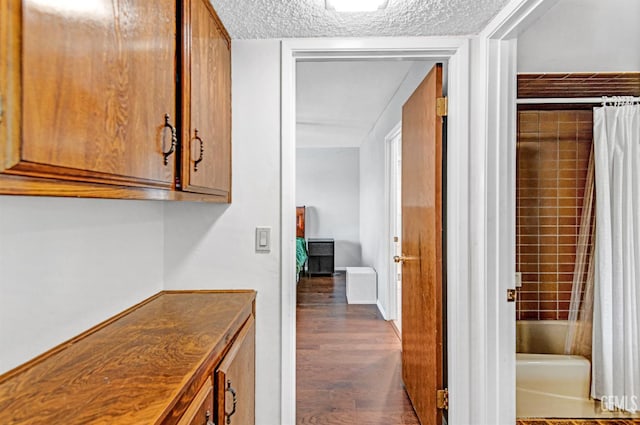 7701 Shetland Dr, Bakersfield, CA 93309 - hall featuring dark wood finished floors and a textured ceiling