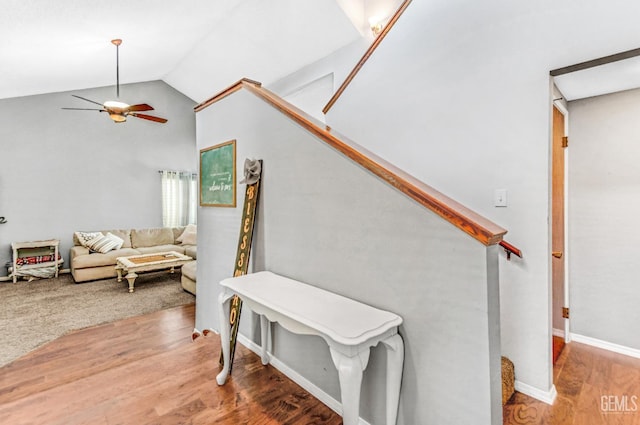 7701 Shetland Dr, Bakersfield, CA 93309 - stairway with wood finished floors, vaulted ceiling, and ceiling fan