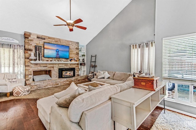 7701 Shetland Dr, Bakersfield, CA 93309 - living room featuring a ceiling fan, wood finished floors, high vaulted ceiling, and a fireplace