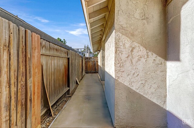 7701 Shetland Dr, Bakersfield, CA 93309 - view of side of home featuring stucco siding
