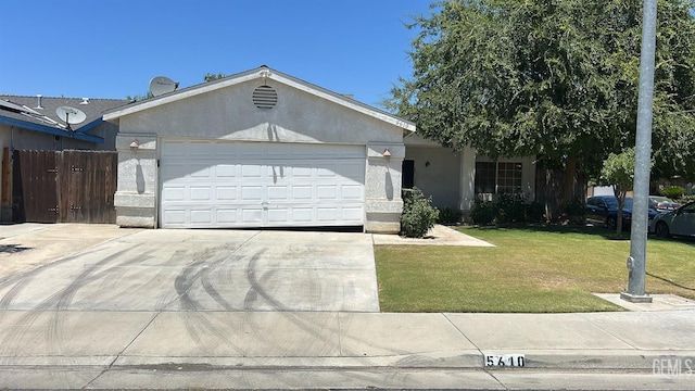 5610 Plute Pass St, Bakersfield, CA 93307 - single story home featuring driveway, a garage, and stucco siding