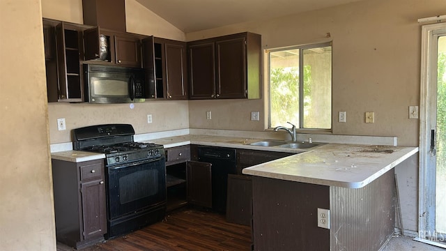 5610 Plute Pass St, Bakersfield, CA 93307 - kitchen with black appliances, open shelves, a peninsula, dark brown cabinetry, and vaulted ceiling