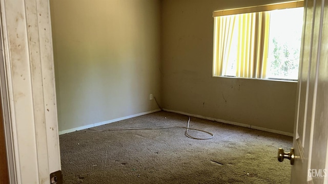 5610 Plute Pass St, Bakersfield, CA 93307 - carpeted empty room featuring baseboards