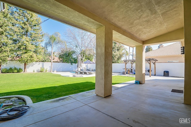 view of patio with a pergola and a fenced backyard