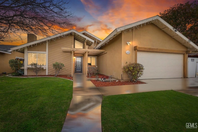4608 Posada Ave, Bakersfield, CA 93309 - view of front facade with a garage and a yard