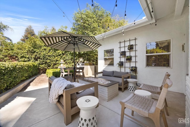 6707 Park W Cir, Bakersfield, CA 93308 - view of patio with an outdoor living space with a fire pit