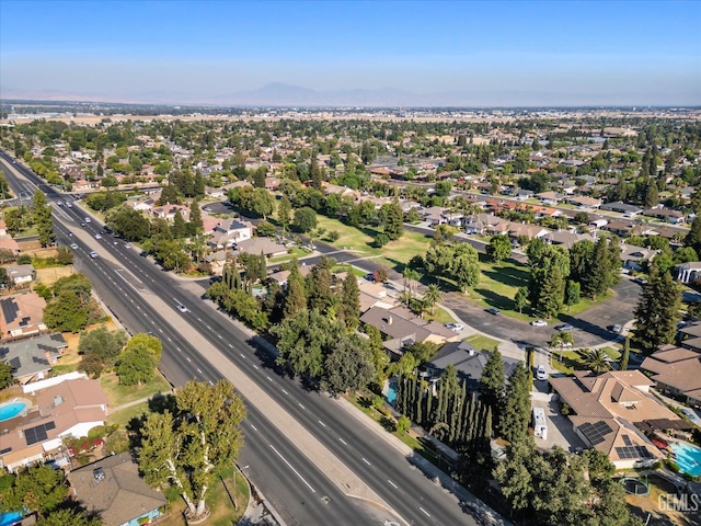 6707 Park W Cir, Bakersfield, CA 93308 - aerial overview of property's location featuring a mountainous background and nearby suburban area
