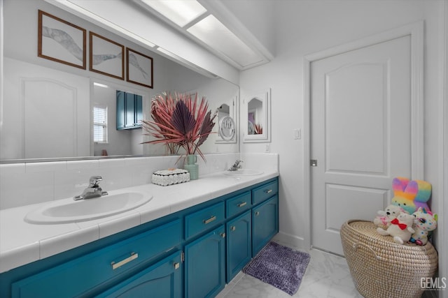 6707 Park W Cir, Bakersfield, CA 93308 - bathroom featuring double vanity and marble finish flooring