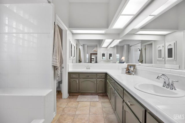 6707 Park W Cir, Bakersfield, CA 93308 - bathroom featuring double vanity and walk in shower