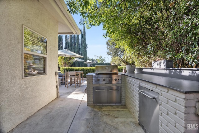6707 Park W Cir, Bakersfield, CA 93308 - view of patio featuring area for grilling