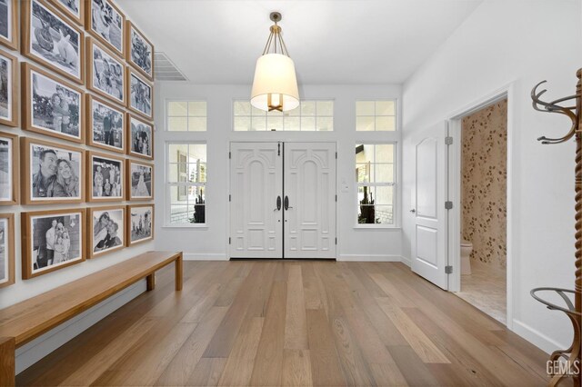 6707 Park W Cir, Bakersfield, CA 93308 - entryway with wood finished floors and plenty of natural light