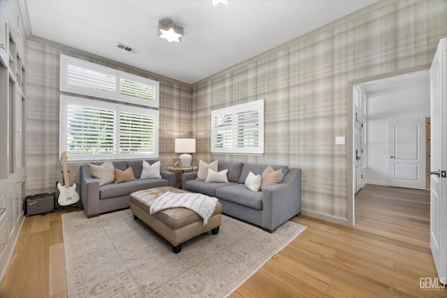 6707 Park W Cir, Bakersfield, CA 93308 - living room with wallpapered walls and light wood finished floors