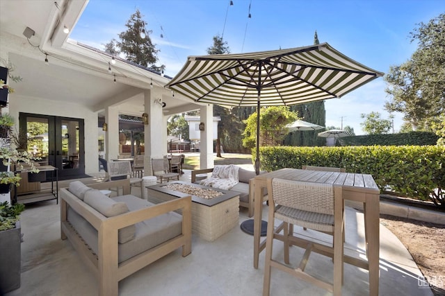 6707 Park W Cir, Bakersfield, CA 93308 - view of patio / terrace featuring a fire pit, french doors, and outdoor dining space