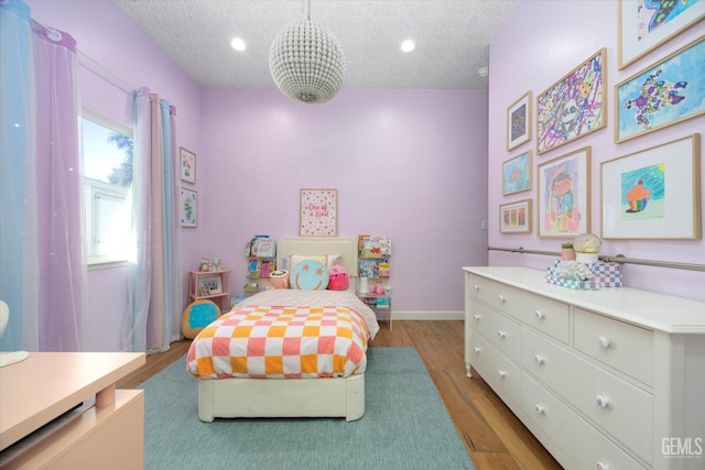 6707 Park W Cir, Bakersfield, CA 93308 - bedroom with light wood-type flooring and recessed lighting