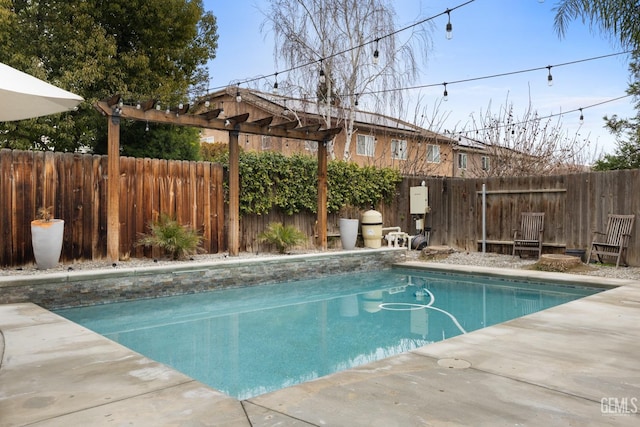 view of pool featuring a fenced in pool, a patio area, a fenced backyard, and a pergola