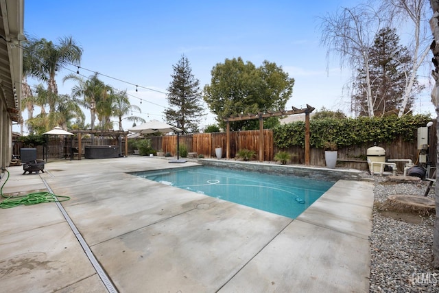 view of pool with a patio, central AC, a fenced backyard, and a fenced in pool