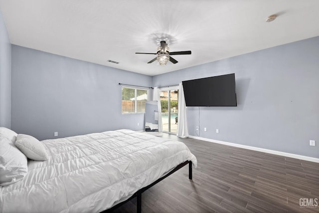 bedroom with visible vents, baseboards, ceiling fan, dark wood-type flooring, and access to exterior