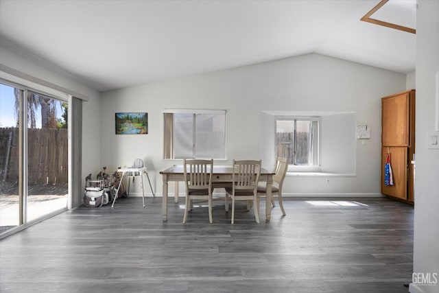 4715 Peacock Ct, Bakersfield, CA 93313 - dining room featuring lofted ceiling, dark wood-style floors, and baseboards