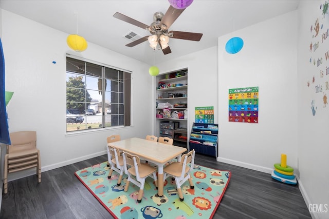 4715 Peacock Ct, Bakersfield, CA 93313 - game room featuring dark wood-style flooring, ceiling fan, and baseboards