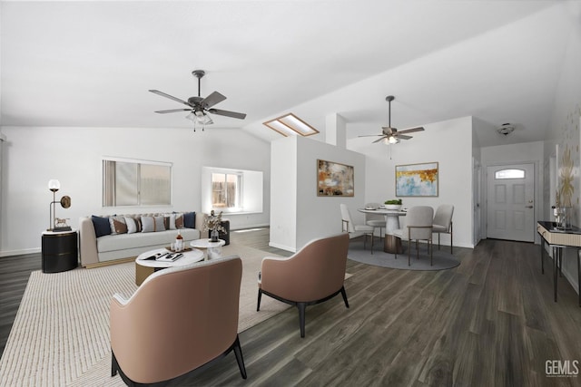 4715 Peacock Ct, Bakersfield, CA 93313 - living room featuring ceiling fan, vaulted ceiling, dark wood-type flooring, and baseboards
