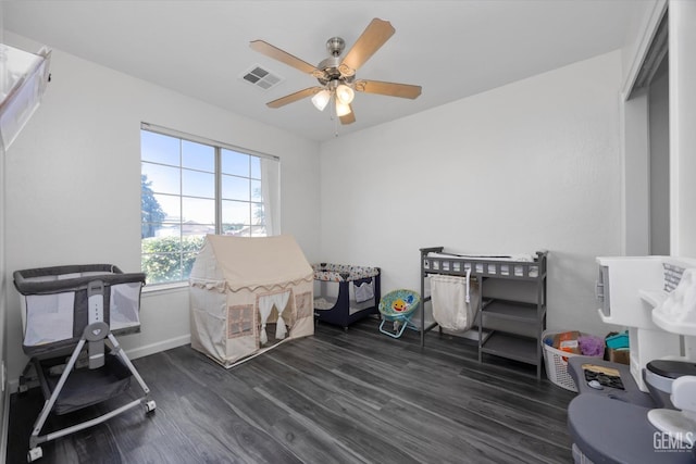 4715 Peacock Ct, Bakersfield, CA 93313 - game room featuring dark wood-style flooring, ceiling fan, and baseboards