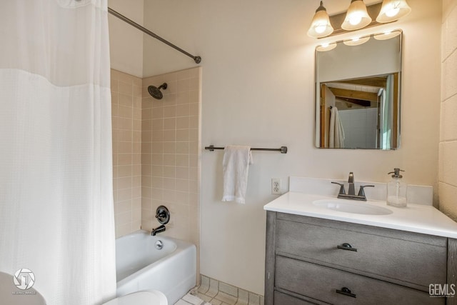 2221 Myrtle St, Bakersfield, CA 93301 - full bath with vanity, baseboards, and shower / bath combo with shower curtain