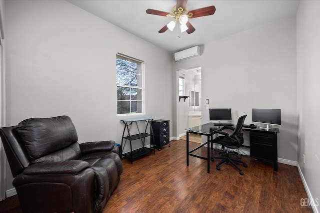 office space with wood finished floors, ceiling fan, baseboards, and a wall mounted AC