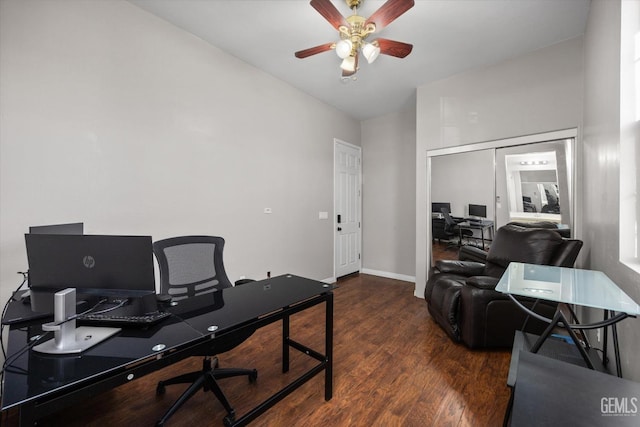 office featuring a ceiling fan, baseboards, and wood finished floors