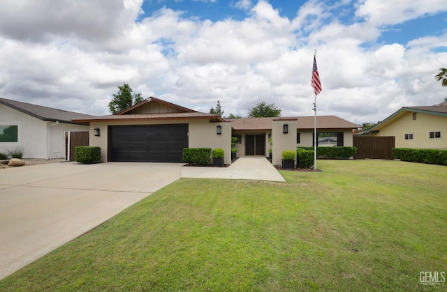 109 Bermuda St, Bakersfield, CA 93309 - ranch-style home featuring a garage, driveway, and stucco siding