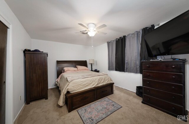 109 Bermuda St, Bakersfield, CA 93309 - bedroom featuring light carpet, baseboards, and a ceiling fan