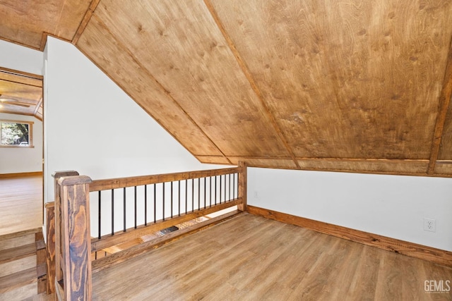 bonus room featuring hardwood / wood-style flooring, lofted ceiling, and wood ceiling