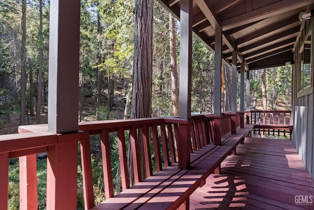 wooden terrace featuring a porch