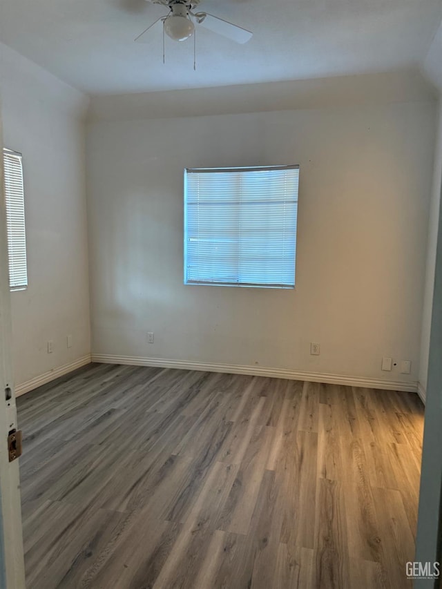 1107 Monterey St, Bakersfield, CA 93305 - empty room with wood finished floors and ceiling fan