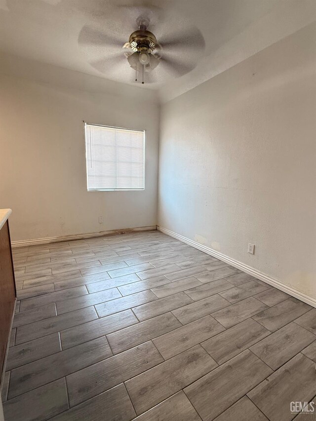 1107 Monterey St, Bakersfield, CA 93305 - spare room with a ceiling fan and wood finish floors